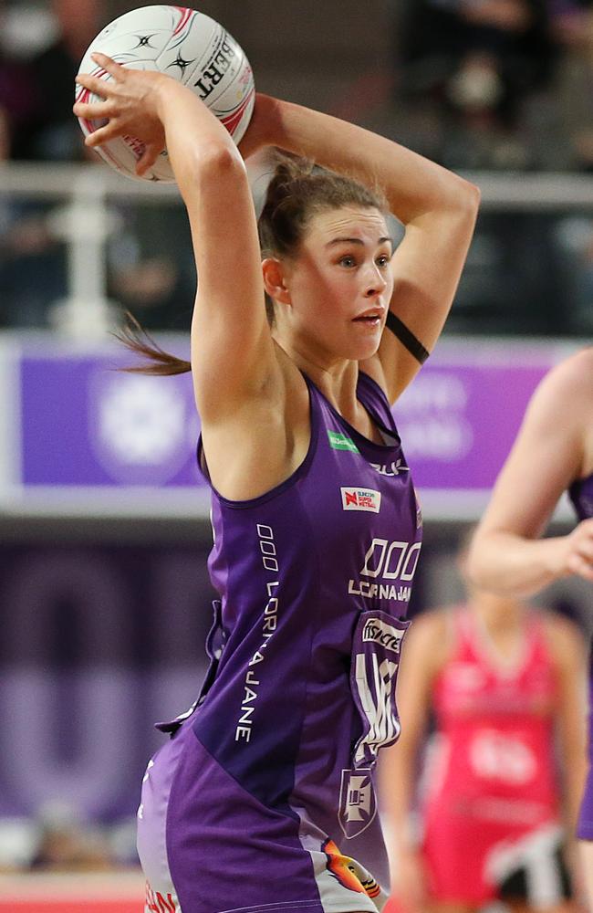 Macy Gardner of the Firebirds passes the ball during the Round 12 Super Netball match between the Queensland Firebirds and the Adelaide Thunderbirds at the Brisbane Arena in Brisbane, Sunday, August 11, 2019. PHOTO: AAP /Jono Searle