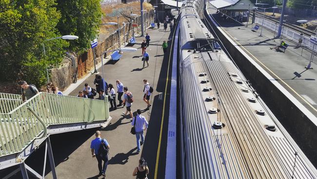 Commuters head home from Hurlstone Park train station. Picture: Danielle Buckley