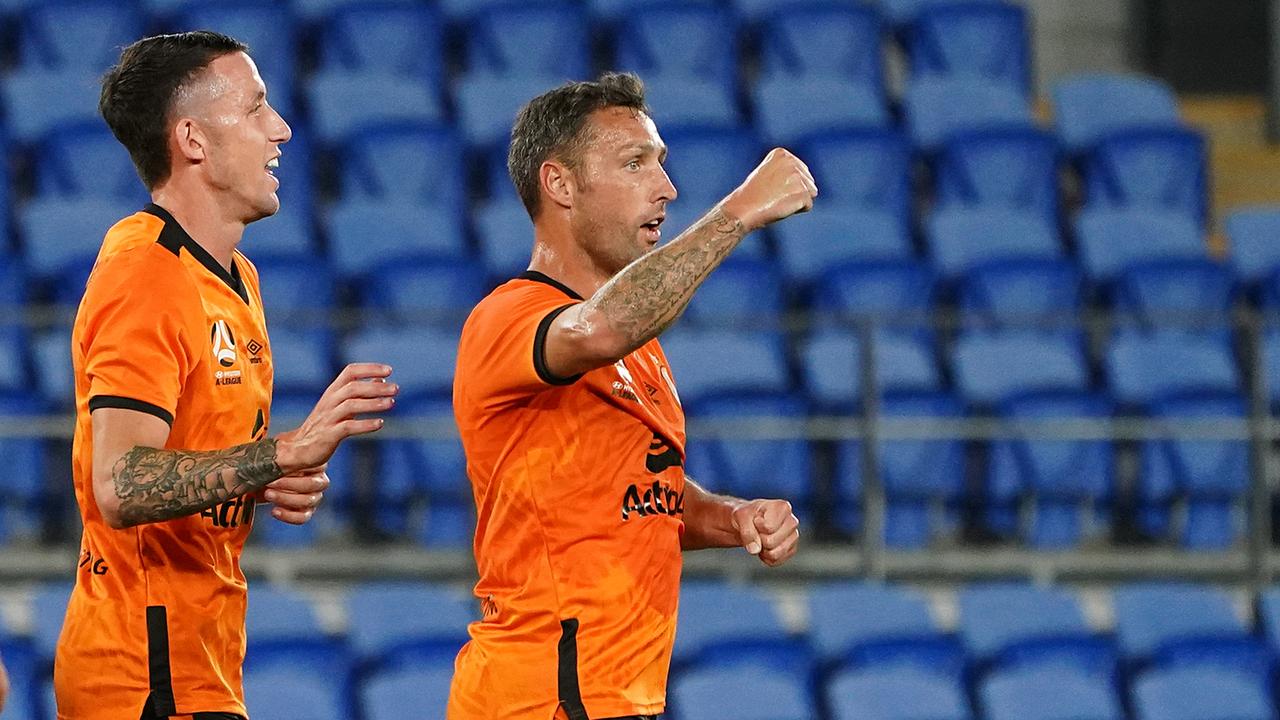 Scott McDonald celebrates scoring a goal. (AAP Image/Dave Hunt)