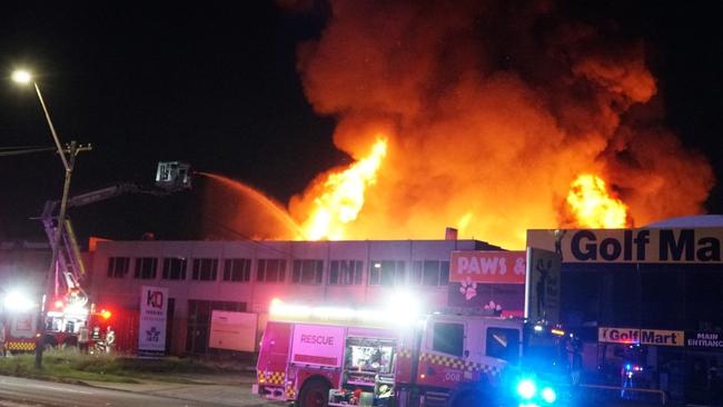 Firefighters have successfully contained a massive factory fire in Sydney's southwest. Picture: Sydney Emergency