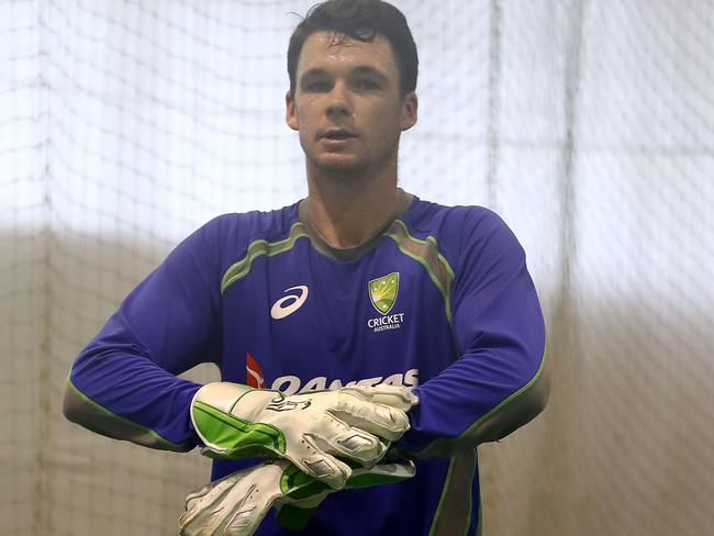 Peter Handsomb practises his wicketkeeping at training on Sunday.