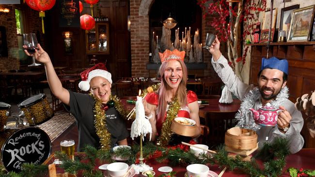 Jayda Wilson, Kieren Berry and Aaron Ratanatray celebrate Christmas with yum cha at Rosemont Hall. Picture: Tricia Watkinson