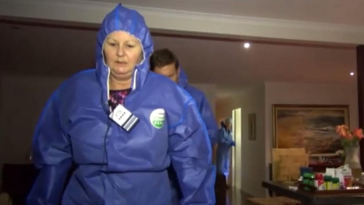 Image grabs from Police video of Torso killer Lindy Williams Lindy showing police where she found Georges body,in the ensuite bathroom and wear she got tarp and rope to wrap and tie george's body and put in car