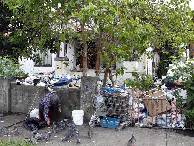 The Boonara Ave, Bondi property with owner Mary Bobolas feeding pigeons. Picture: Sam Ruttyn