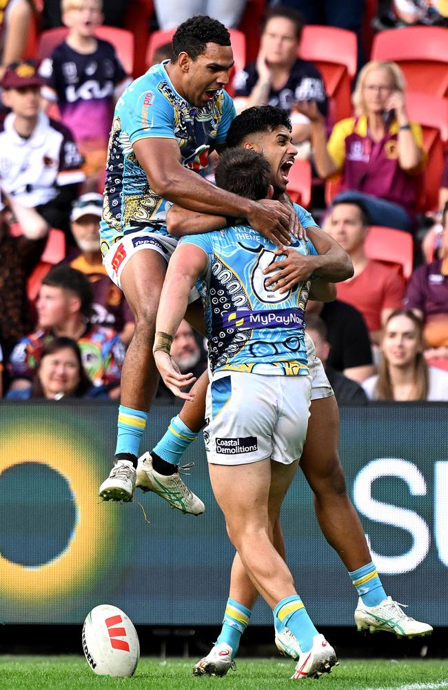 The Titans celebrate a try. Picture: Bradley Kanaris/Getty Images