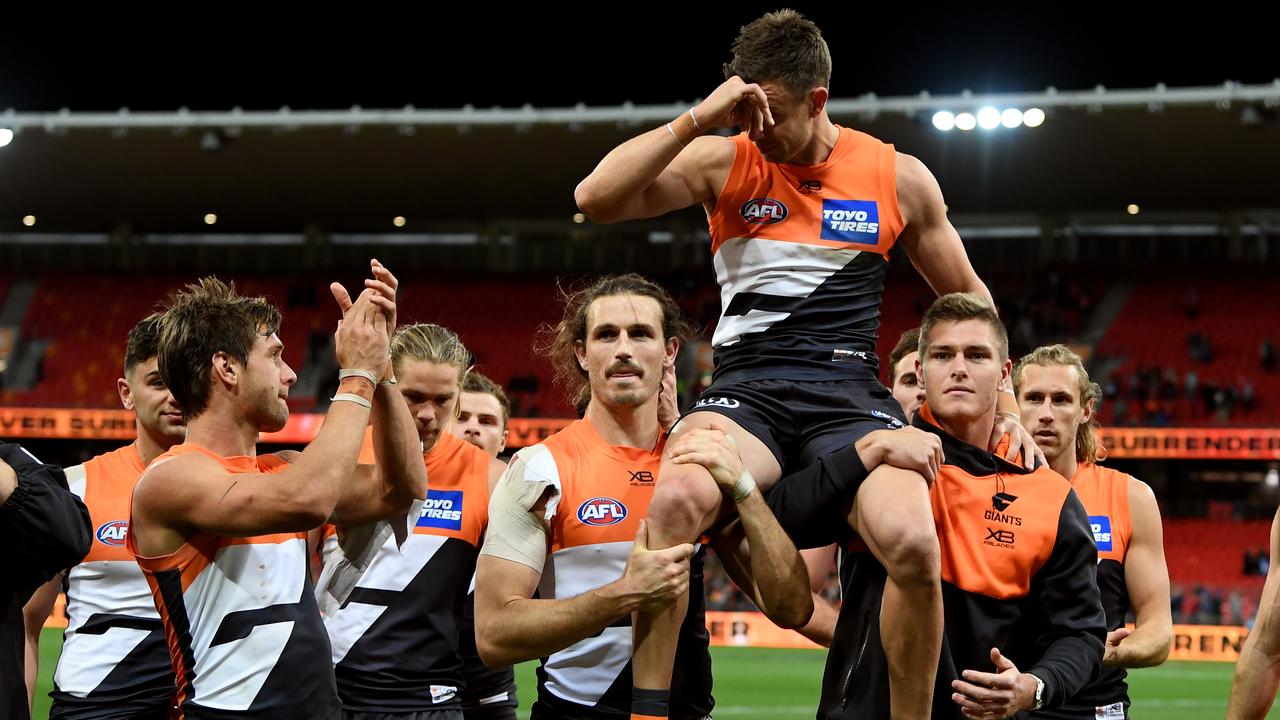 An emotional Brett Deledio is chaired off on Saturday.