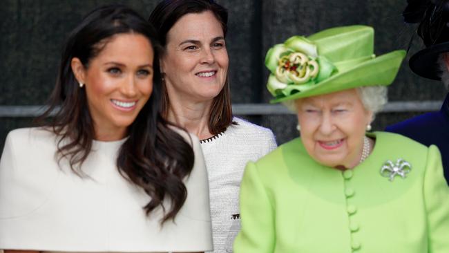 WIDNES, UNITED KINGDOM - JUNE 14: (EMBARGOED FOR PUBLICATION IN UK NEWSPAPERS UNTIL 24 HOURS AFTER CREATE DATE AND TIME) Meghan, Duchess of Sussex and Queen Elizabeth II (accompanied by Samantha Cohen) attend a ceremony to open the new Mersey Gateway Bridge on June 14, 2018 in Widnes, England. Meghan Markle married Prince Harry last month to become The Duchess of Sussex and this is her first engagement with the Queen. During the visit the pair will open a road bridge in Widnes and visit The Storyhouse and Town Hall in Chester. (Photo by Max Mumby/Indigo/Getty Images)