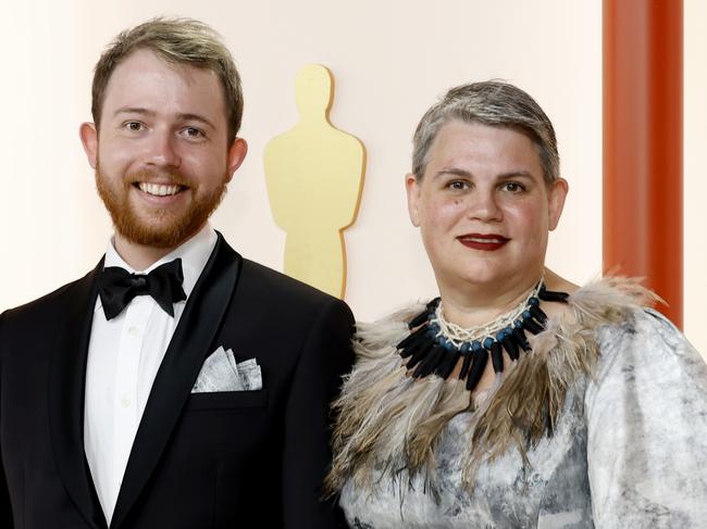 HOLLYWOOD, CALIFORNIA - MARCH 12: (L-R) Lachlan Pendragon and guest attend the 95th Annual Academy Awards on March 12, 2023 in Hollywood, California. (Photo by Mike Coppola/Getty Images)