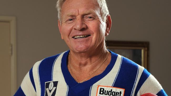 Barry Cable has been elevated to legend status in the AFL Hall Of Fame. Here at home he proudly dons one of his old North Melbourne jumpers.