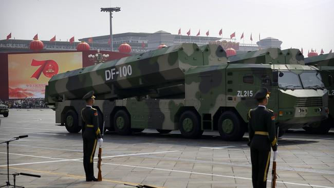 Chinese military vehicles carrying DF-100 cruise missiles. Picture: AP