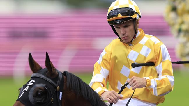 Tim Clark (pictured) combines with trainer Gary Moore and can land a race to race double with Harapan and Valoria. Picture Getty Images