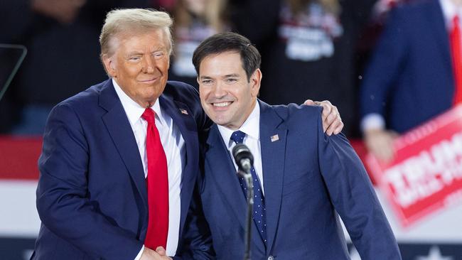 Donald Trump greets Marco Rubio during a campaign rally at the J.S. Dorton Arena in Raleigh, North Carolina, on November 4, 2024. Picture: AFP