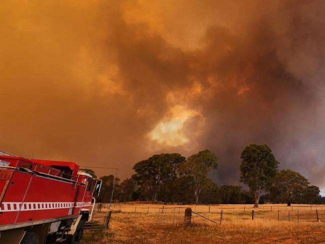 21/12/2024 North Hamilton Rural Fire Brigade members watch over a bushfire in the Grampians: Picture North Hamilton Rural Fire Brigade/Facebook, ,