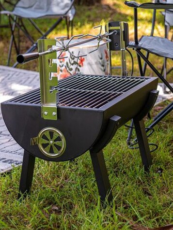 Bunnings Jumbuck 'Rondo' Small Charcoal Spit Roaster - Electric, $84.90. Picture: Supplied.