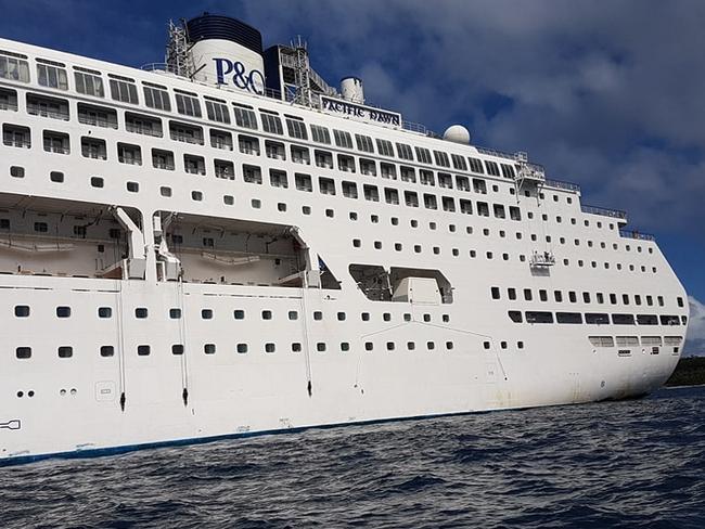 P &amp; O Cruise ship Pacific Dawn on it's way back to Brisbane after a woman went overboard off the coast of New Caledonia.