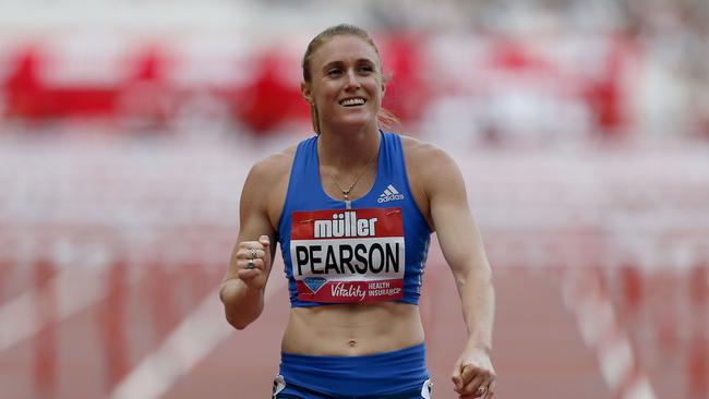 Australia's Sally Pearson celebrates winning silver in the Women's 100 metre Hurdles final during the London Anniversary Games.