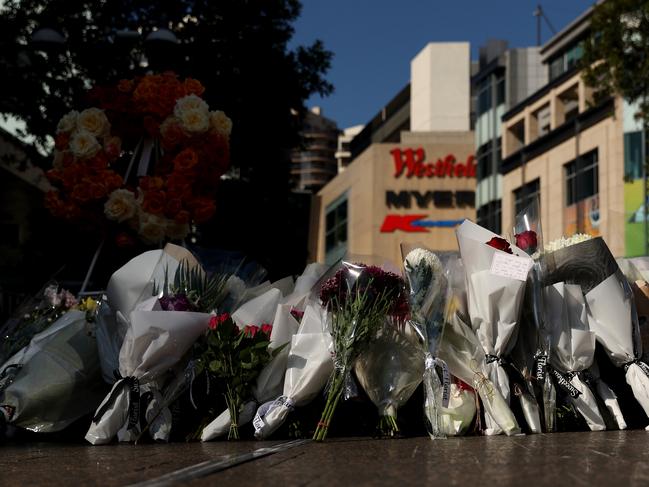 BONDI JUNCTION, AUSTRALIA - APRIL 16: Flowers are placed outside Westfield Shopping mall in honour of the victims on April 16, 2024 in Bondi Junction, Australia. Six victims, plus the offender, who was shot by police at the scene, are dead following a stabbing attack at Westfield Shopping Centre Bondi Junction in Sydney on April 13, 2024. (Photo by Brendon Thorne/Getty Images) (Photo by Brendon Thorne/Getty Images)