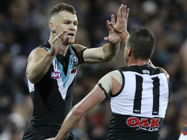 12/05/18 - AFL - Round 8, SHOWDOWN - Port Adelaide v Adelaide Crows at Adelaide Oval. Robbie Gray celebrates one of his goals with Tom Rockliff. Picture SARAH REED