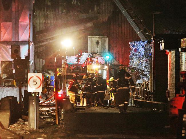 Firefighters battle the huge fire. Picture: Hamish Blair