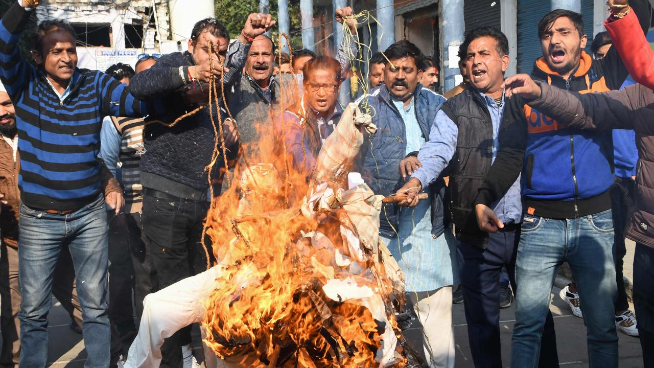 Activists from Shiv Sena Taksali shout slogans as they burn effigies of 'rapists' to protest against the alleged rape and murder of a 27-year-old veterinary doctor in Hyderabad. Picture: AFP