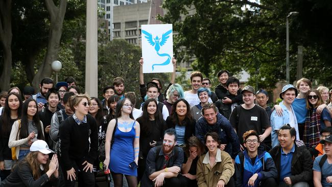 Players from ’Team Mystic’ taking part in a group game of Pokemon Go. Picture: Richard Dobson