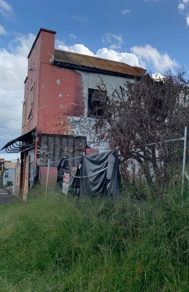 The remains from the fire at 108 Alma Street.