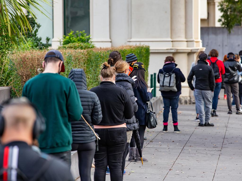 Long queues at Royal Exhibition Building vaccination hub as people wait for the jab on Saturday. Picture: NCA NewsWire / Sarah Matray