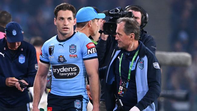 Cameron Murray was assisted off the field in Origin II after copping an early head knock. Picture: Bradley Kanaris/Getty Images