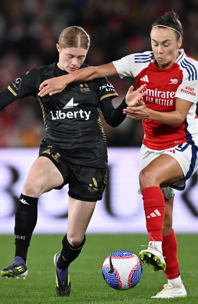 Cortnee Vine (left) doing battle with fellow Australian star Caitlin Foord (right) in a recent exhibition match between the A-League All Stars and Arsenal. Picture: Daniel Pockett/Getty Images