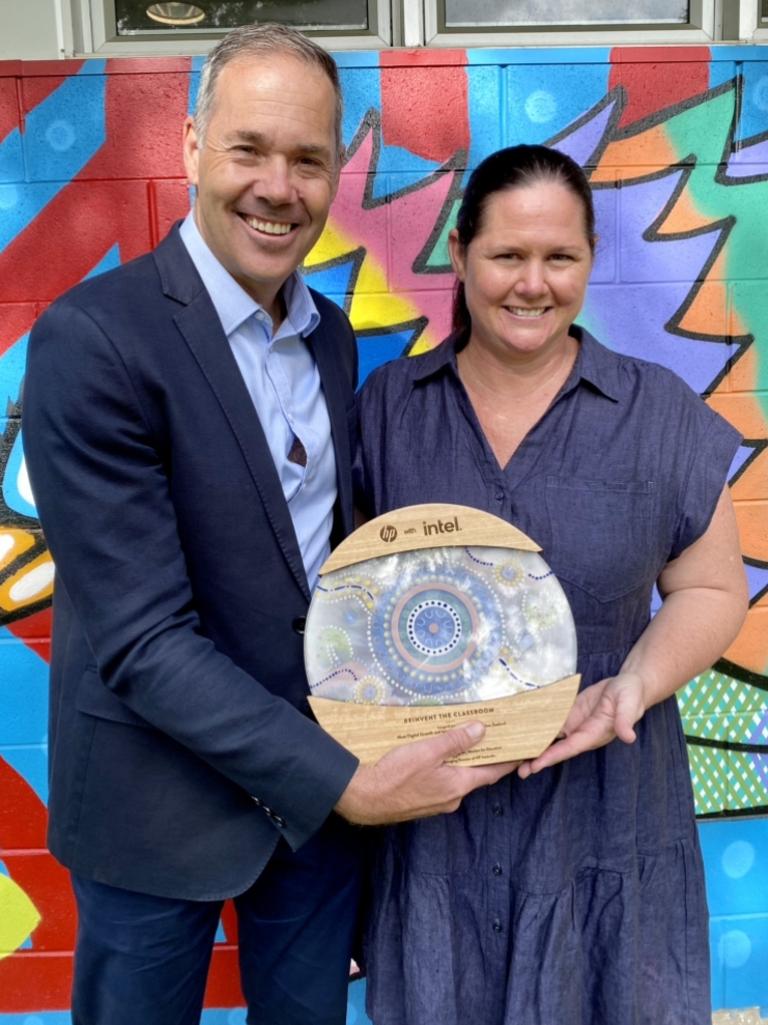 HP managing director Brad Pulford and Berry Springs Primary School principal Carlie Mamo celebrate the school's digital transformation in February.