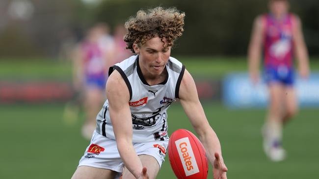 MELBOURNE, AUSTRALIA - AUG 18: Jett Grayland of the Rebels chases the ball during the 2024 Coates Talent League Boys Round 18 match between the Oakleigh Chargers and the GWV Rebels at RSEA Park on Aug 18, 2024 in Melbourne, Australia. (Photo by Scott Sidley/AFL Photos)