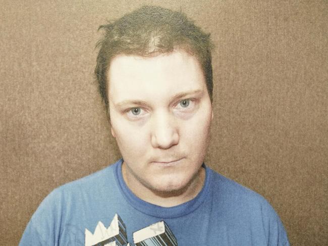 Chris Malyschko as photographed by police shortly after his arrest in October 2011. Photo copied from Brief of Evidence. (ZAKGRIEVESPECIAL)