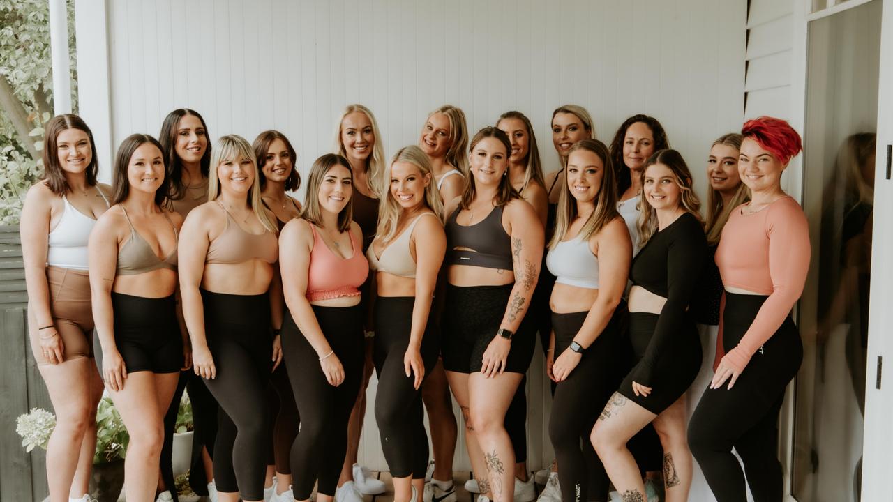 Geelong online health and fitness coach Ruby Darcy with her clients ahead of her Empower Action Summit at GMHBA stadium. Picture: Supplied