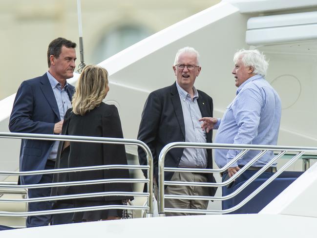 Clive Palmer (right) hosts LNP heavyweights Gary Spence (left) and Bruce McIver on his boat on election night 2020.