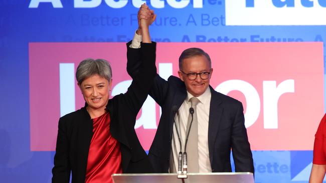 New prime minister Anthony Albanese greets the crowd along with Penny Wong after Labor’s victory in the election. Picture: Sam Ruttyn