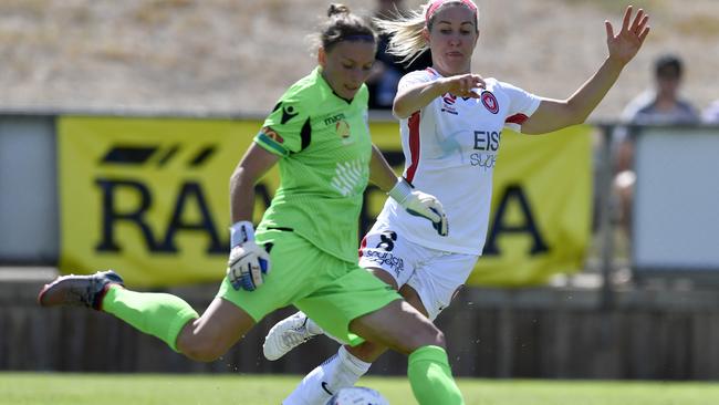 Adelaide United keeper Sarah Willacy is under pressure from Western Sydney’s Erica Halloway during a W-League clash at Marden Stadium in January. Picture: AAP Image/Kelly Barnes).