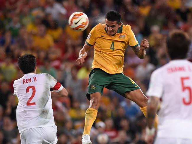 BRISBANE, AUSTRALIA - JANUARY 22: Tim Cahill of Australia heads the ball into the goal during the 2015 Asian Cup match between China PR and the Australian Socceroos at Suncorp Stadium on January 22, 2015 in Brisbane, Australia. (Photo by Matt Roberts/Getty Images)