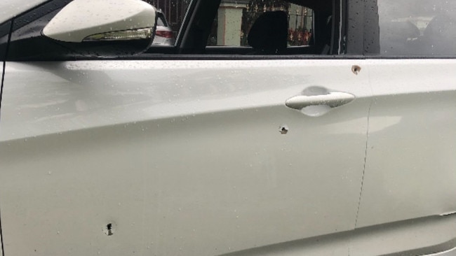 A white Hyundai was found after the shooting riddled with bullet holes.