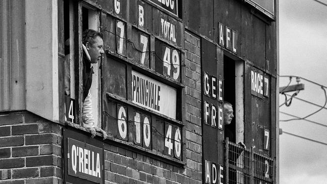 Keen scorers watch on.