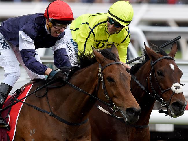 Almandin jockey Kerrin McEvoy, (left), is congratulated by Heartbreak City hoop Joao Moreira.