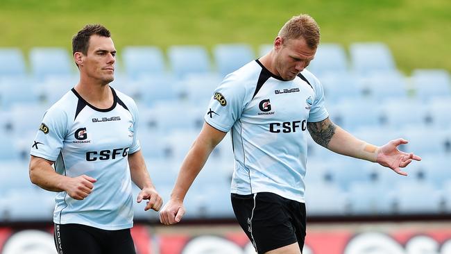 John Morris and Luke Lewis during their time at Cronulla. Picture: Brett Costello