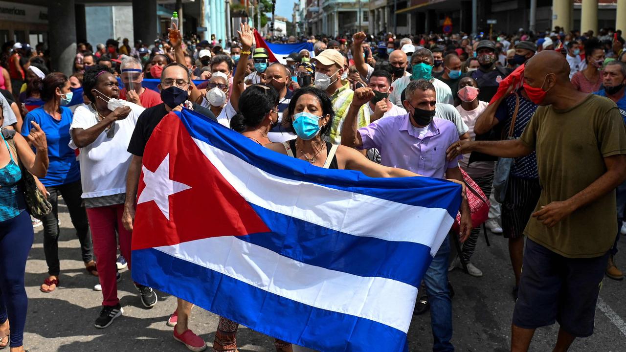 Cubans demonstrating against their authoritarian government. Picture: Yamil Lage/AFP