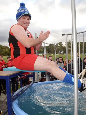 Blackburn president Matt Breen before taking a dip into the Fight MND bucket. Picture: Steve Tanner