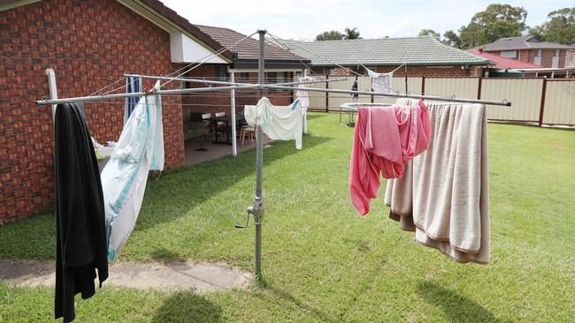 Clothes left on the clothes lines for the last two months at the home of Rowan Baxter. Picture: Liam Kidston