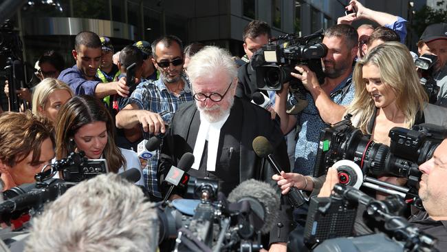 Robert Richter QC surrounded by the media scrum outside court. Picture: Alex Coppel