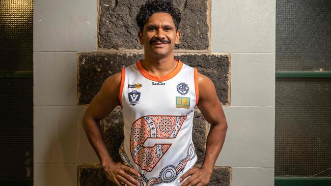 Ethan Liddle with the jumper he designed ahead of AFL Barwon Indigenous round. Picture: Brad Fleet