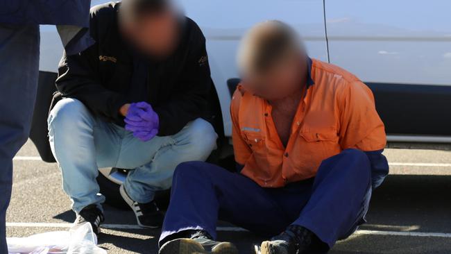 A man arrested in Mascot arrest as part of the raids.