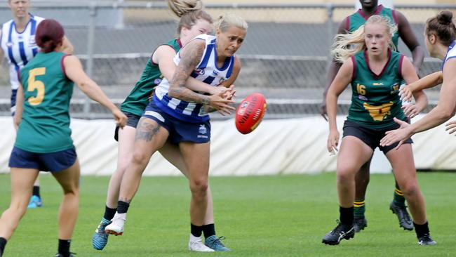 Moana Hope is tackled at training during North Melbourne’s trip to Tasmania. Picture: Patrick Gee