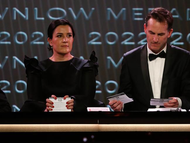 MELBOURNE, AUSTRALIA - SEPTEMBER 18: Laura Kane, General Manager - AFL Competitions and Andrew Dillon, Executive General Manager, General Counsel count the votes during the 2022 Brownlow Medal at Crown Palladium on September 18, 2022 in Melbourne, Australia. (Photo by Dylan Burns/AFL Photos)