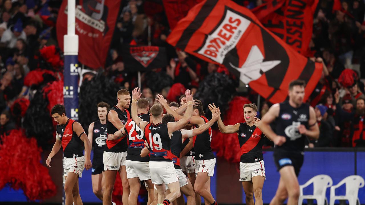MELBOURNE - June 11 : AFL. Nic Martin of the Bombers celebrates a 3rd quarter goal during the round 13 AFL match between Carlton and Essendon at the MCG on June 11, 2023, in Melbourne, Australia. Photo by Michael Klein.